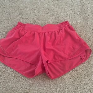 Size 8, 2.5 inch  pink lululemon shorts
